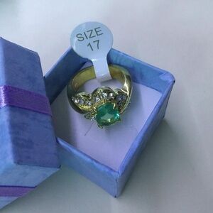 Gold Ring with Green Gemstone and Crystal Accents